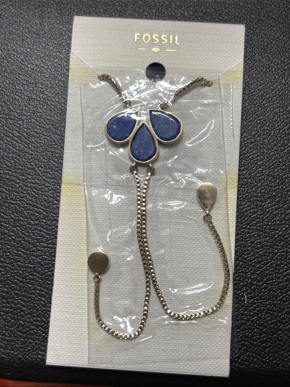 Fossil Silver-Tone necklace  with Blue Petal Charm adj